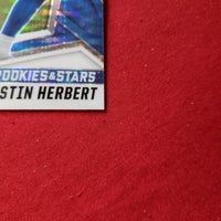 Load image into Gallery viewer, 2021 Rookies &amp; Stars Justin Herbert Disco Prizm #75 LA Chargers SHIPPING IS INCLUDED
